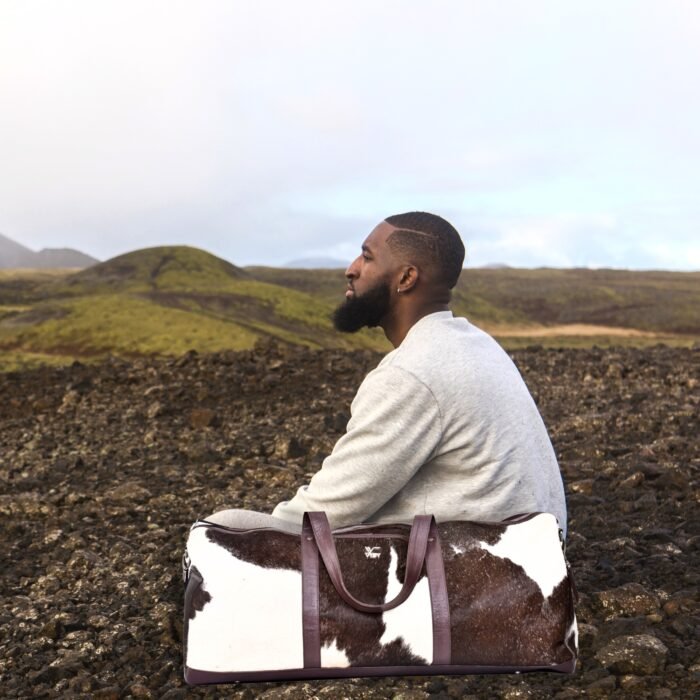 Experience luxury travel with our Real hair on Leather Duffel Bag. Perfect for weekends or gym sessions, this spacious Brown Weekender Bag offers both style and durability. - Image 5